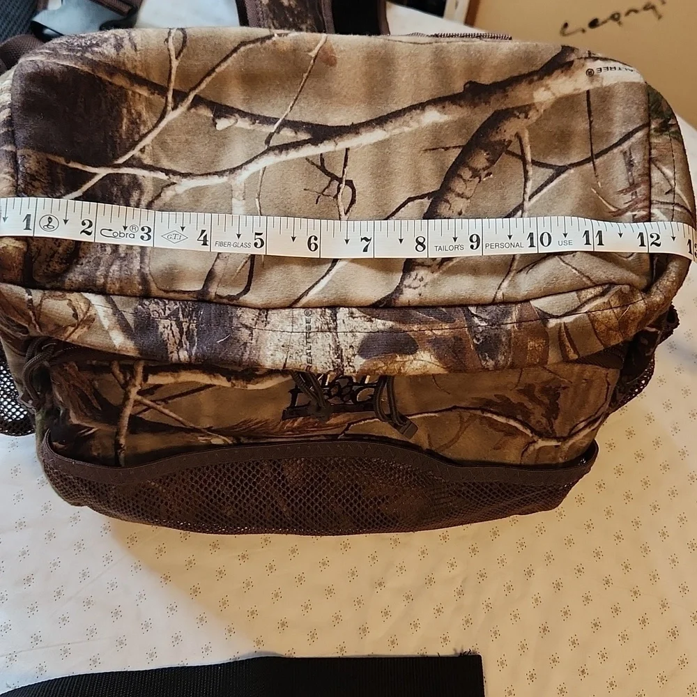 Bundle of 2 - Mad Dog Camo Backpack and Realtree Camo Hunter Outdoor Waist.